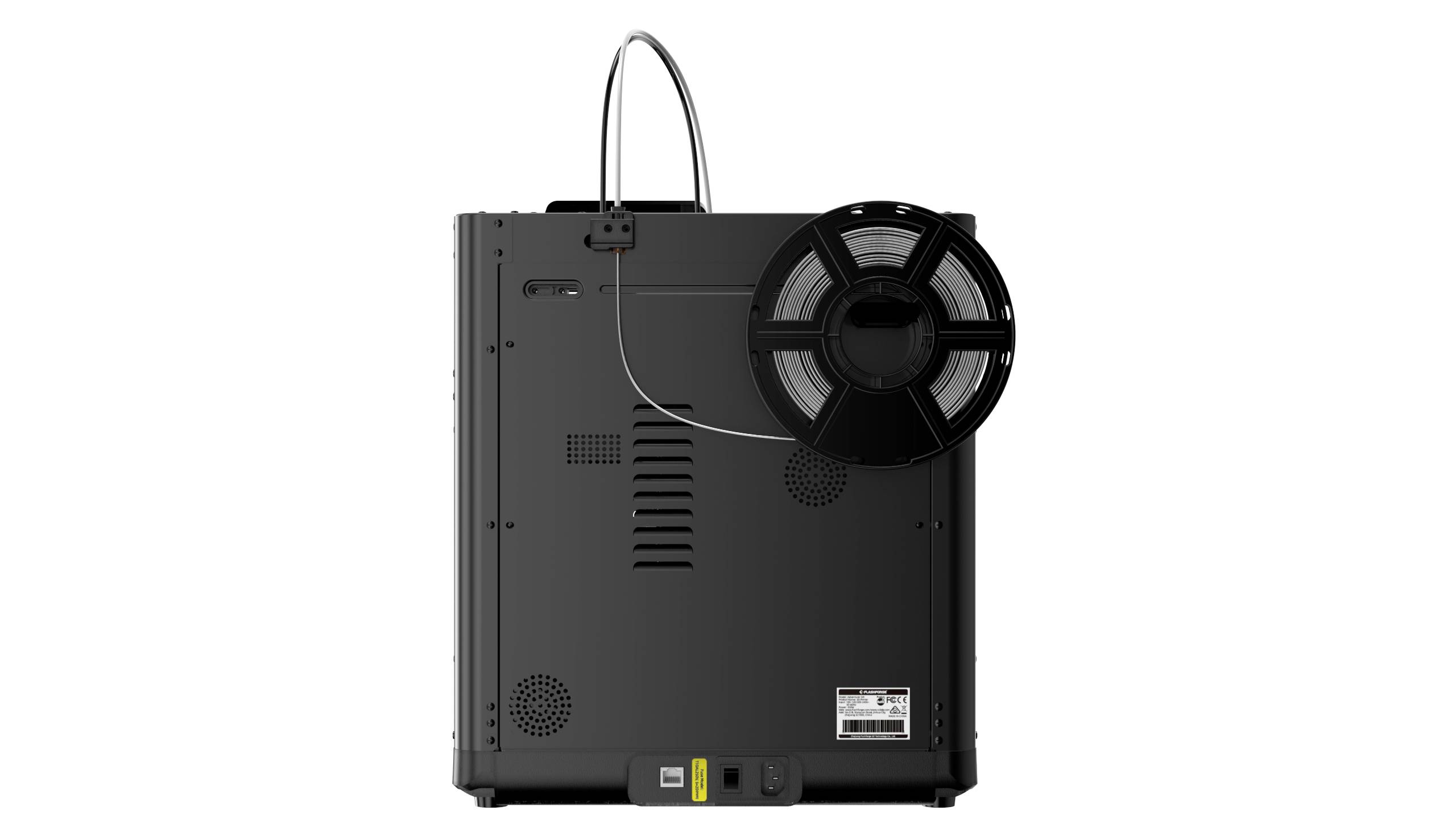 3D tiskárna pohledem zezadu s návikem filamentu umístěným nahoře vpravo. Kabel vede z role do tiskárny. Kryt tiskárny je černý.