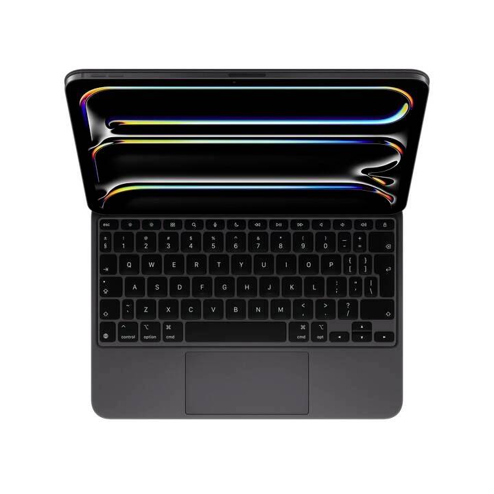 Laptop z ptačí perspektivy, otevřený, s černou klávesnicí a obrazovkou zobrazující barevné linky na černém pozadí.