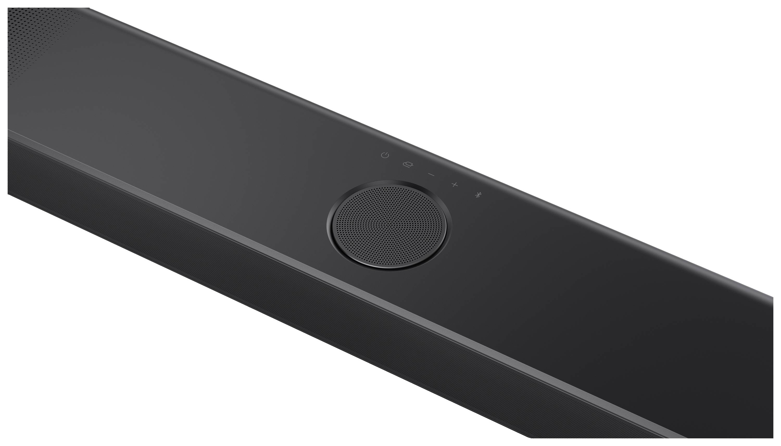 Černý soundbar s centrálním ovladačem hlasitosti a několika malými tlačítky nahoře, vhodný pro domácí kino nebo multimediální sestavy.
