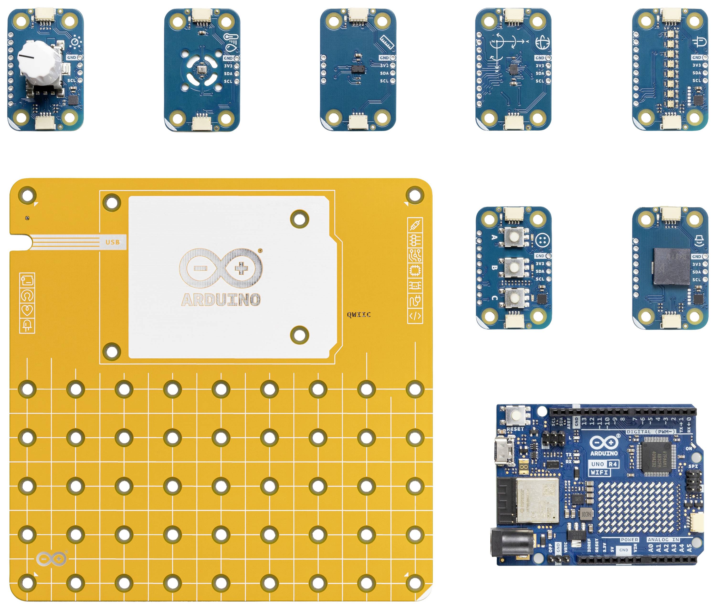 Arduino sada s velkou žlutou senzorovou deskou a několika malými modrými moduly, které reprezentují různé senzory a propojení.