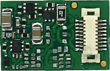 Malá zelená elektronická deska plošných spojů s různými SMD komponenty, včetně rezistorů a kondenzátorů, na jejím povrchu.