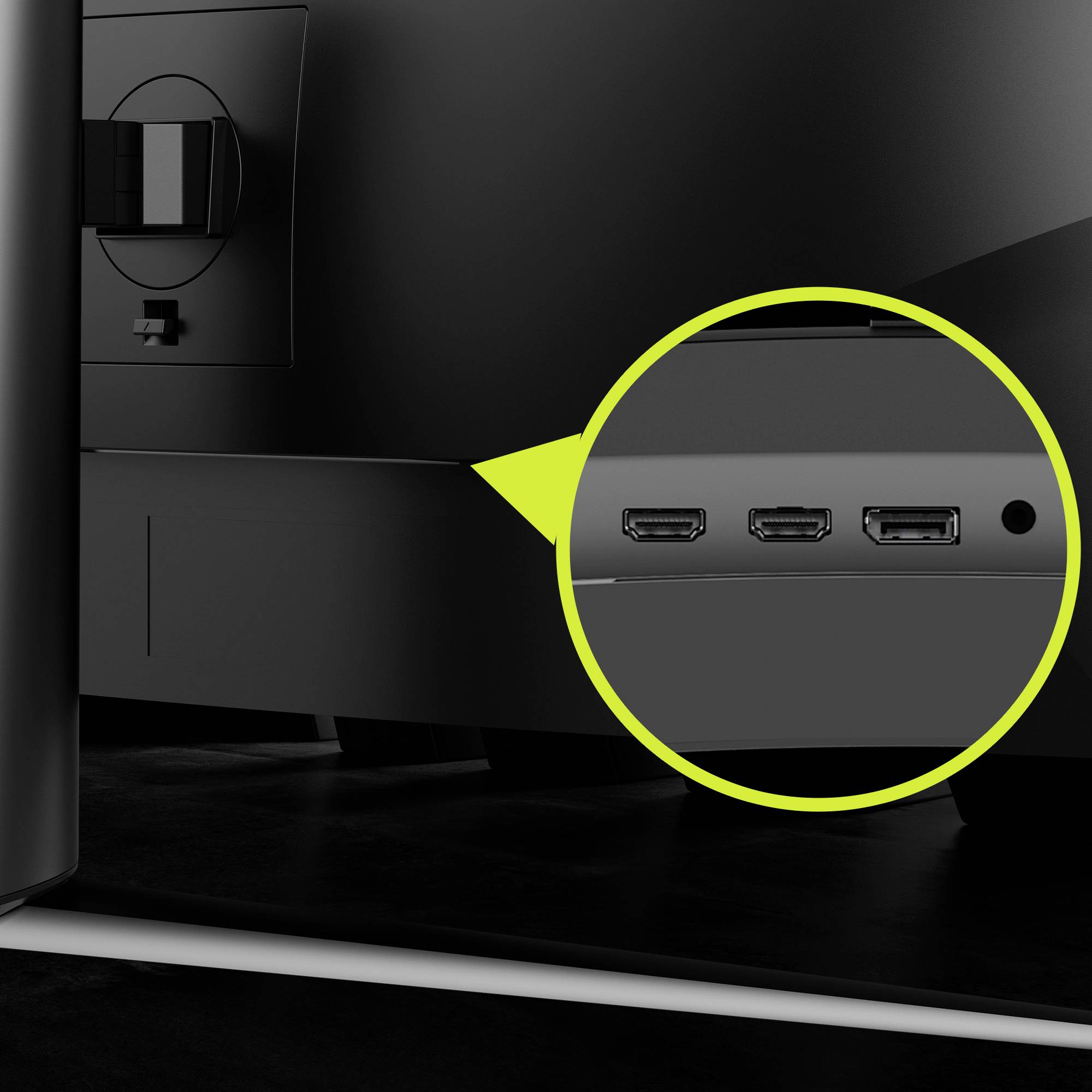 Detailní záběr monitoru s lupou, který ukazuje tři HDMI porty na zadní straně, což je užitečné pro připojení.