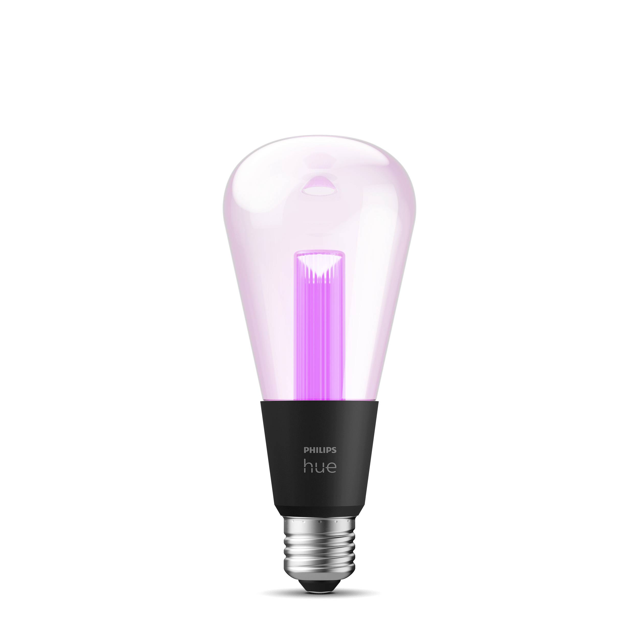 Philips Hue žárovka ukazuje jasné růžové světlo a má černou základnu.