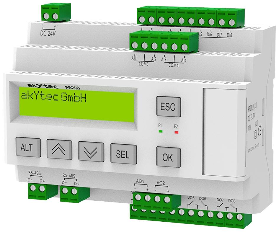 Elektronické řídicí zařízení se zeleným LCD displejem, označené 'akYtec GmbH', s klávesnicí a zelenými připojovacími svorkami pro řídící účely.
