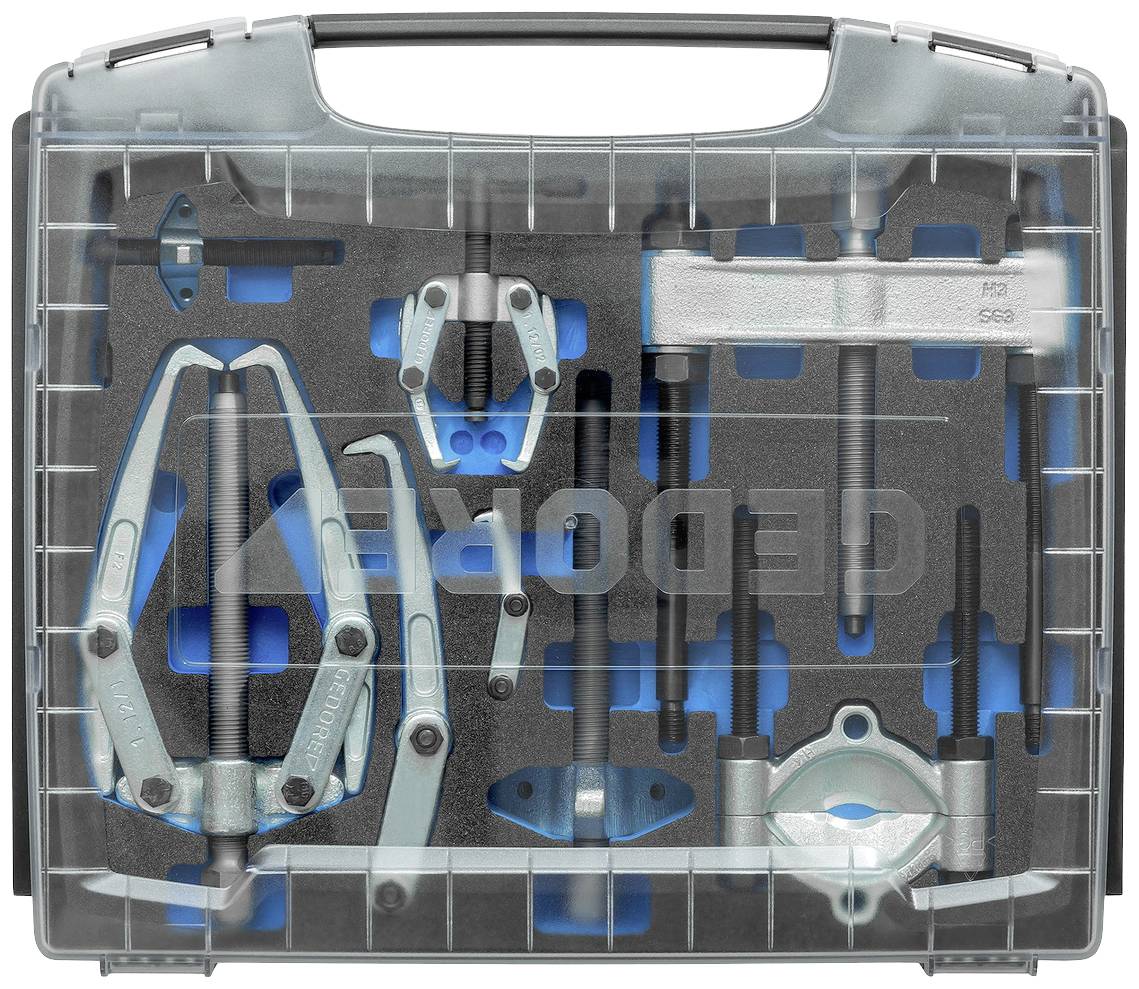 Sada nástrojů s různými kovovými stahovacími přípravky v pěnové vložce. Obsahuje různé velikosti a tvary pro mechanické práce.