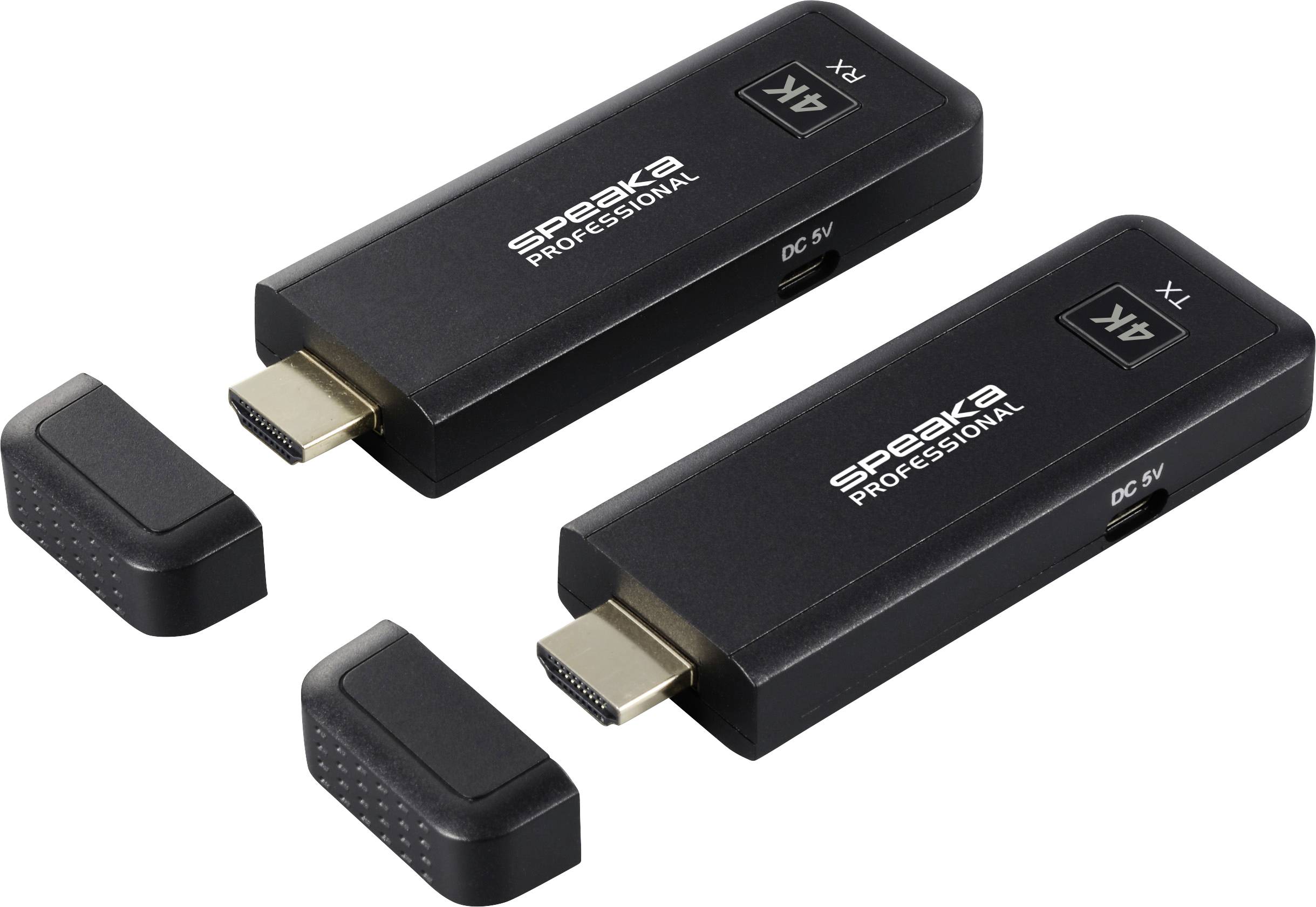 Dva černé bezdrátové HDMI přenosové přístroje s nápisem 'Speaka Professional' a '4K'. Mají kryty a USB napájecí konektory.