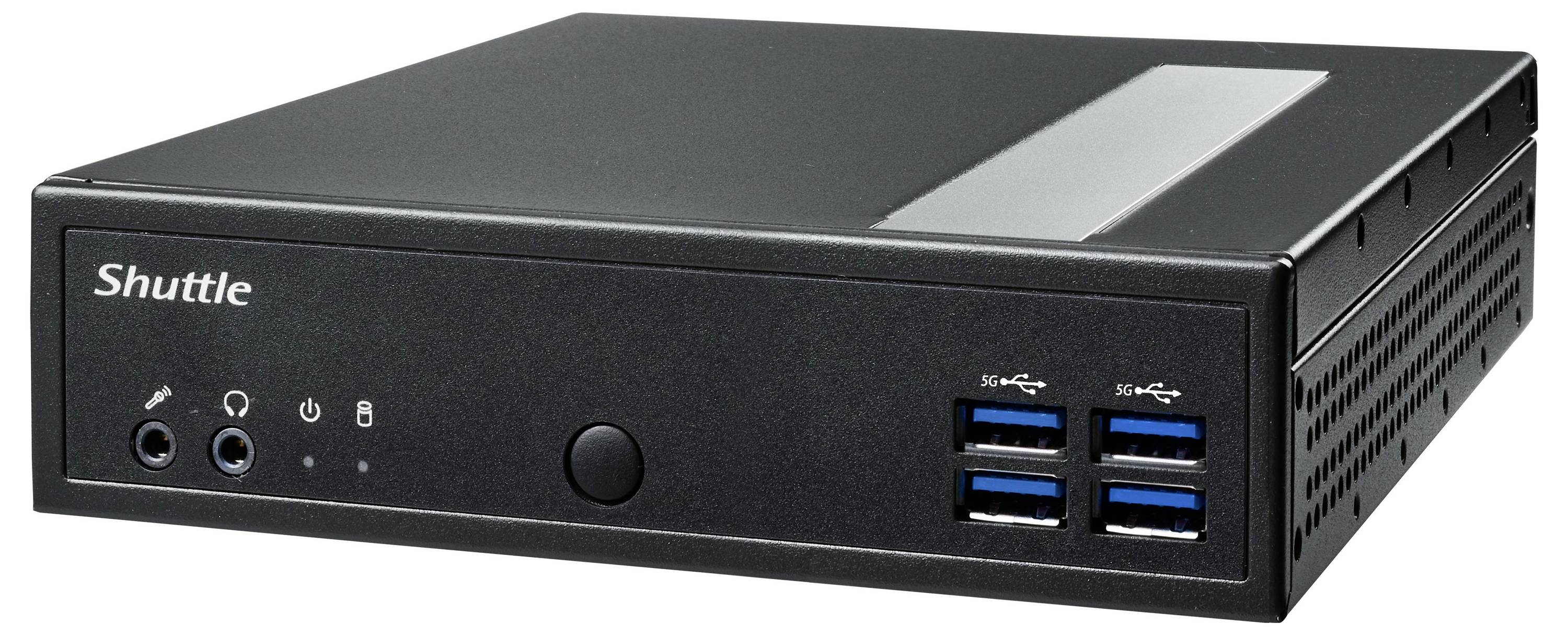 Černý mini počítač s několika USB porty na přední straně. Skříň je kompaktní a nese značku 'Shuttle'.