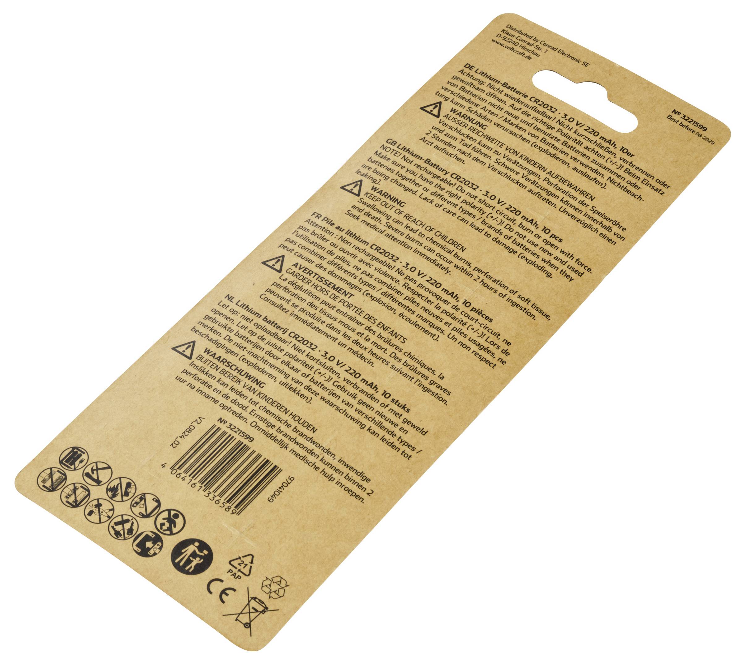 Zadní strana hnědého obalu s pokyny a varováními ve více jazycích. Symboly pro recyklaci, CE a další certifikace.