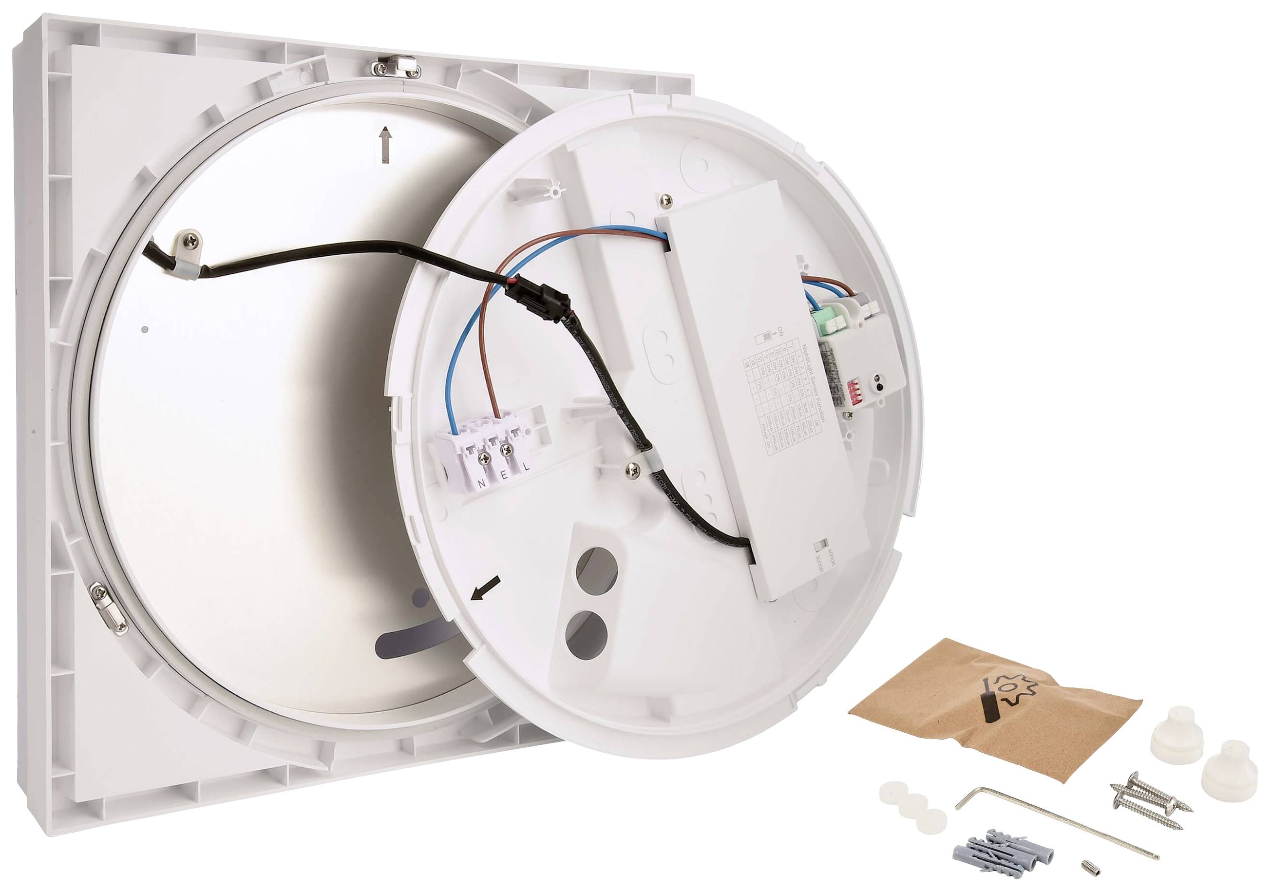 Kulatá LED stropní svítidlo v rozloženém stavu s viditelným elektrickým vedením a příslušenstvím, včetně šroubů a hmoždinek, položené vedle sebe.
