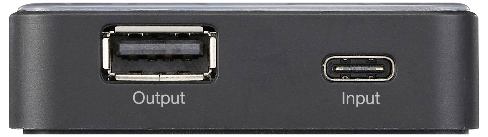 Černý elektronický box s USB připojením 'Output' vlevo a malým vstupem 'Input' vpravo, zobrazuje možnosti připojení.