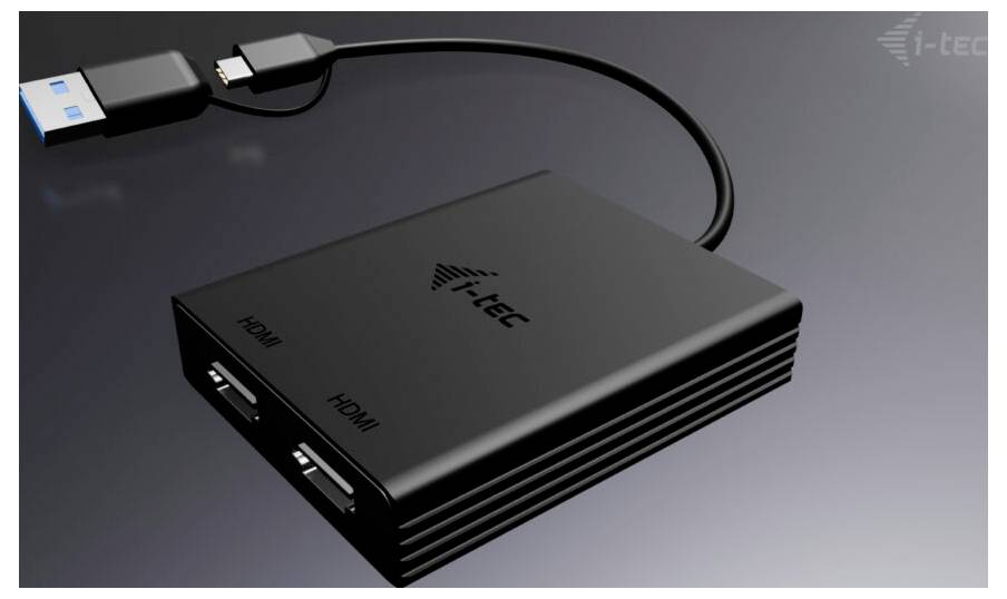 Externí adaptér 'i-tec', černý, s dvěma HDMI porty a USB 3.0 portem, určený pro připojení zobrazovacích zařízení.