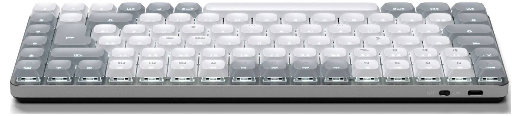 Počítačová klávesnice s podsvícenými, průsvitnými klávesami, které nabízejí futuristický vzhled. USB porty na boku.