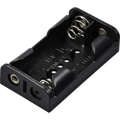 Černý plastový držák baterií pro dva články AA, s kovovými pružinami a označením 1,5V.