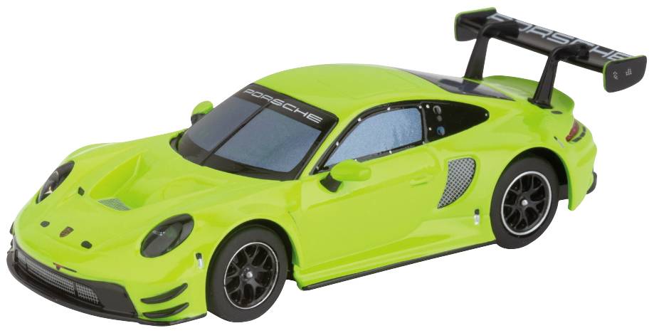 Zářivě zelený sportovní vůz s výrazným zadním křídlem a aerodynamickým designem, pohled z boku.