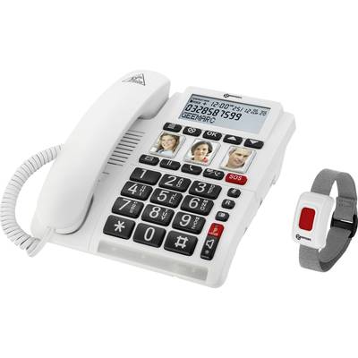 Bílý stolní telefon s velkými tlačítky a fotografiemi kontaktů. Vedle něj náramek s červeným tlačítkem jako tísňový vysílač.