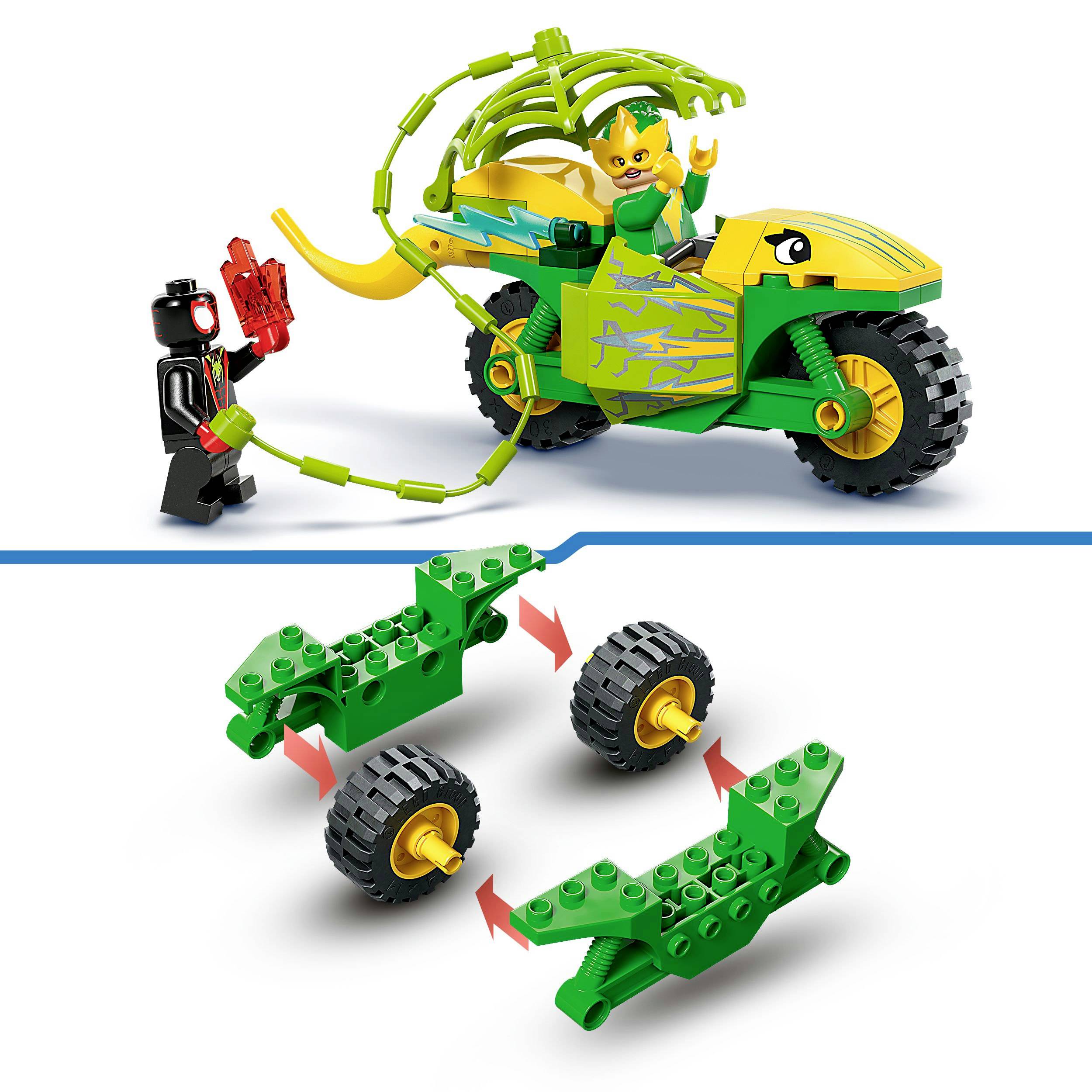 LEGO sada s figurkou na zelené stylizované vozidlo a další figurkou s červenou zbraní. Díly vozidla určené k sestavení.