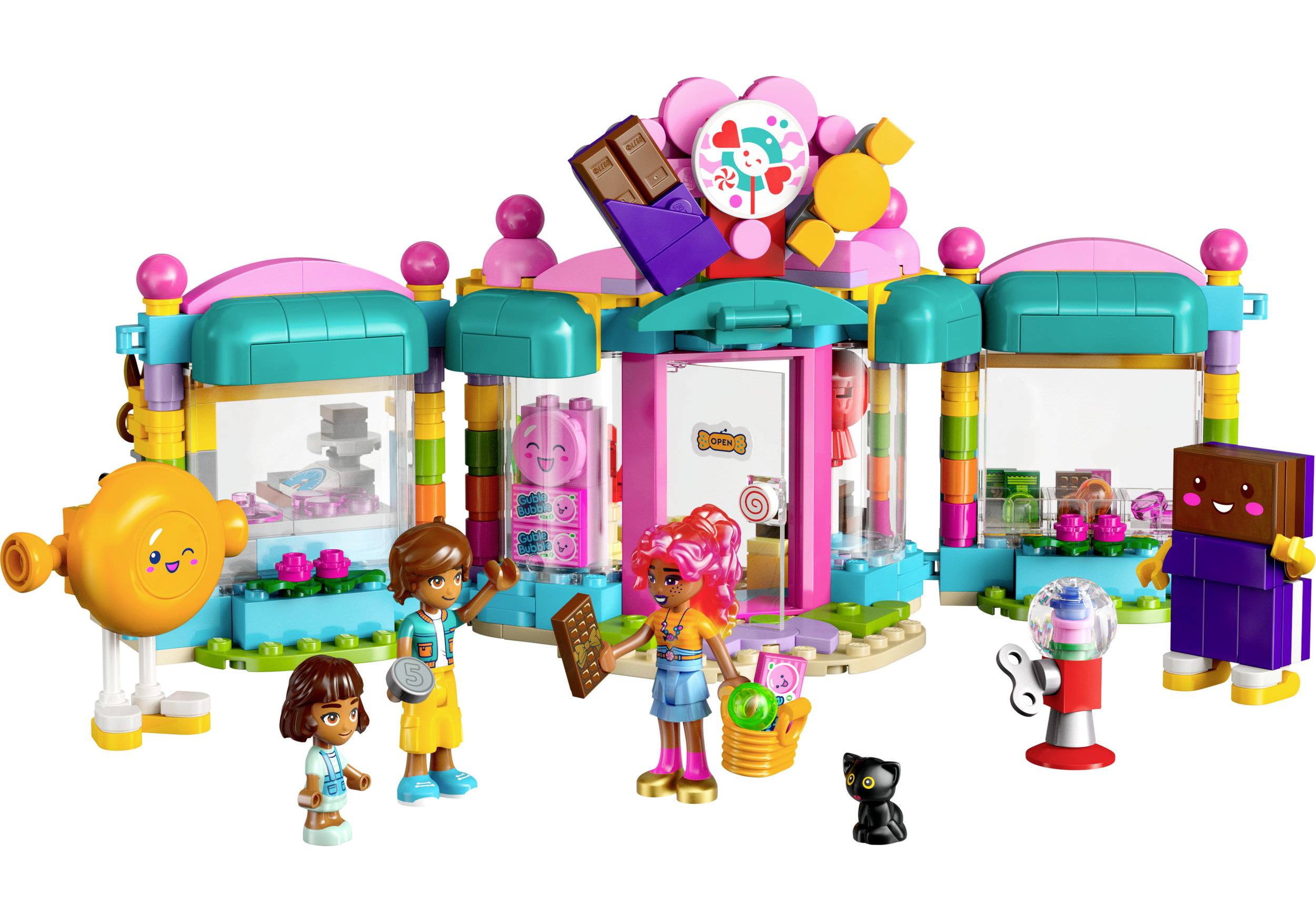 Sada Lego stavebnice s cukrárnou, třemi figurkami a černou kočkou. Pestré dekorace s čokoládovým motivem.