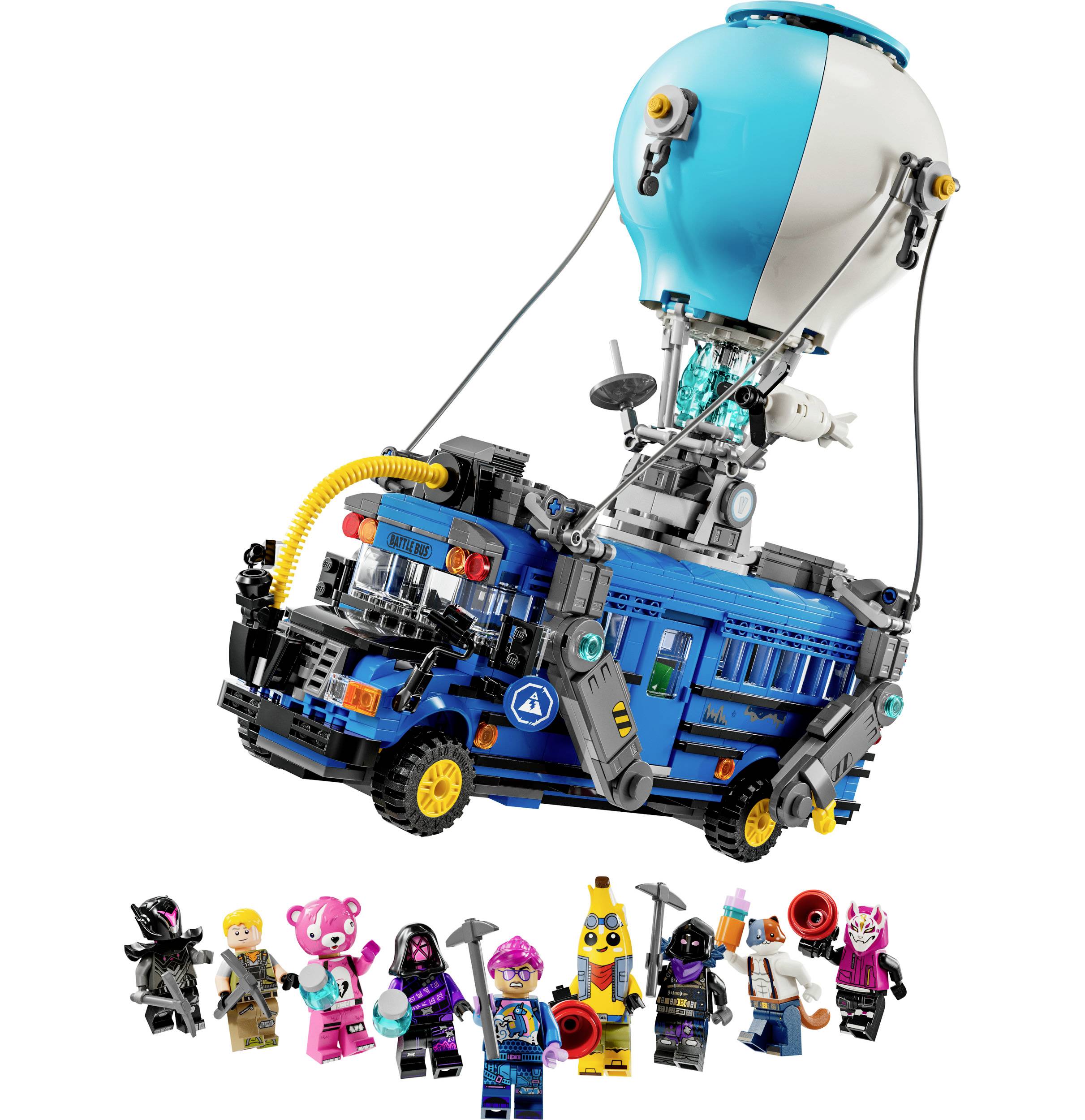 Sada LEGO stavebnice s modrým autobusem a obálkou horkovzdušného balónu, doprovázená devíti barevnými LEGO figurkami v různých kostýmech.