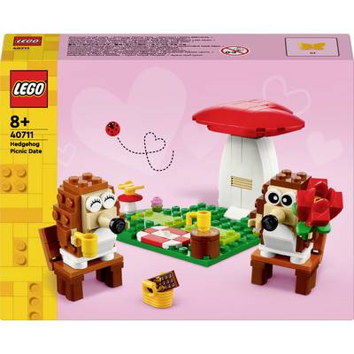 LEGO sada s piknýkem pod velkou houbou, sestávající ze dvou ježků s nápoji. V pozadí láhev a moucha. Vhodné od 8 let.