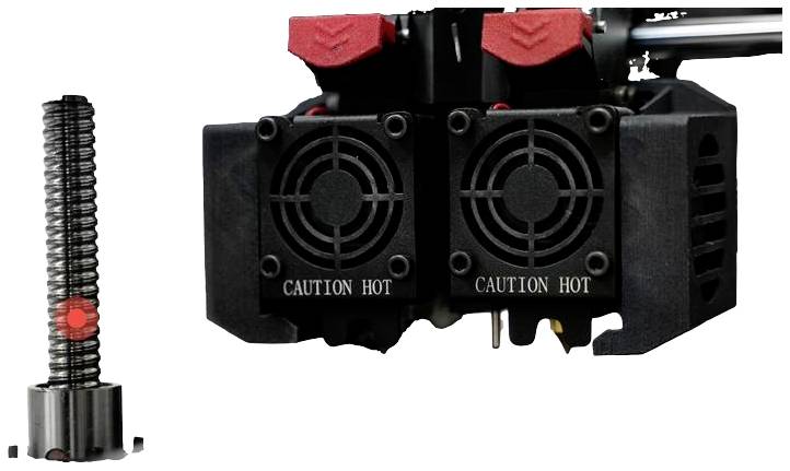 3D tiskařská tryska s dvojitým ventilátorem a topnou cívkou, na níž je nápis 'Caution Hot'. Vlevo je hřídel pro vertikální pohyb.