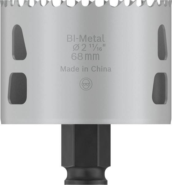 Šedá bimetalová děrovací pila s průměrem 68 mm a nápisem "Made in China", nahoře designové zuby, dole černá rukojeť.