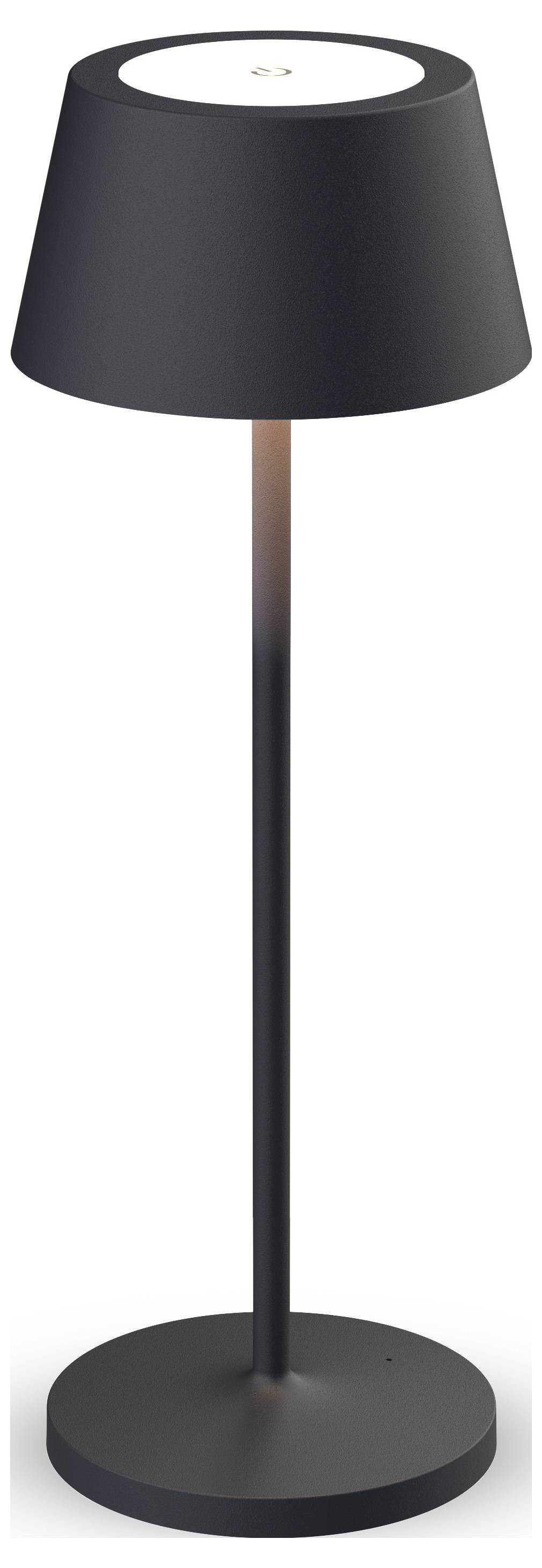 Černá stolní lampa s válcovou základnou a šikmým stínidlem, které vyzařuje teplé světlo dolů.
