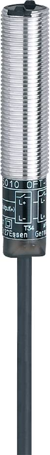 Detailní záběr válcovitého dílu s nápisem 'Essen T34 Germany'. Viditelné symboly a kladné a záporné póly.