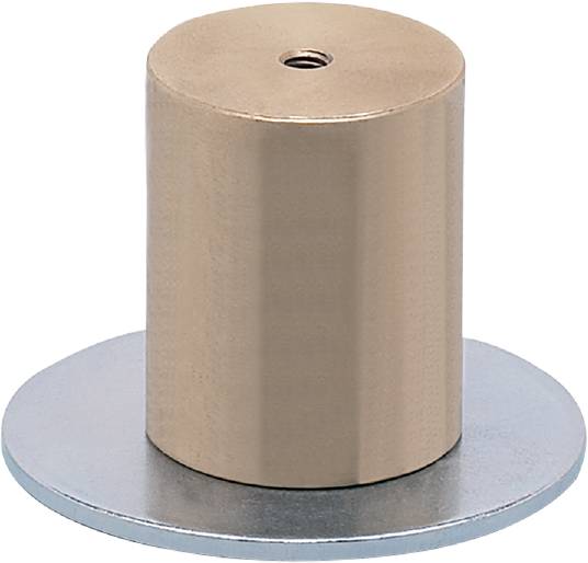 Válcový béžový magnetický díl na kulaté stříbrné základně.