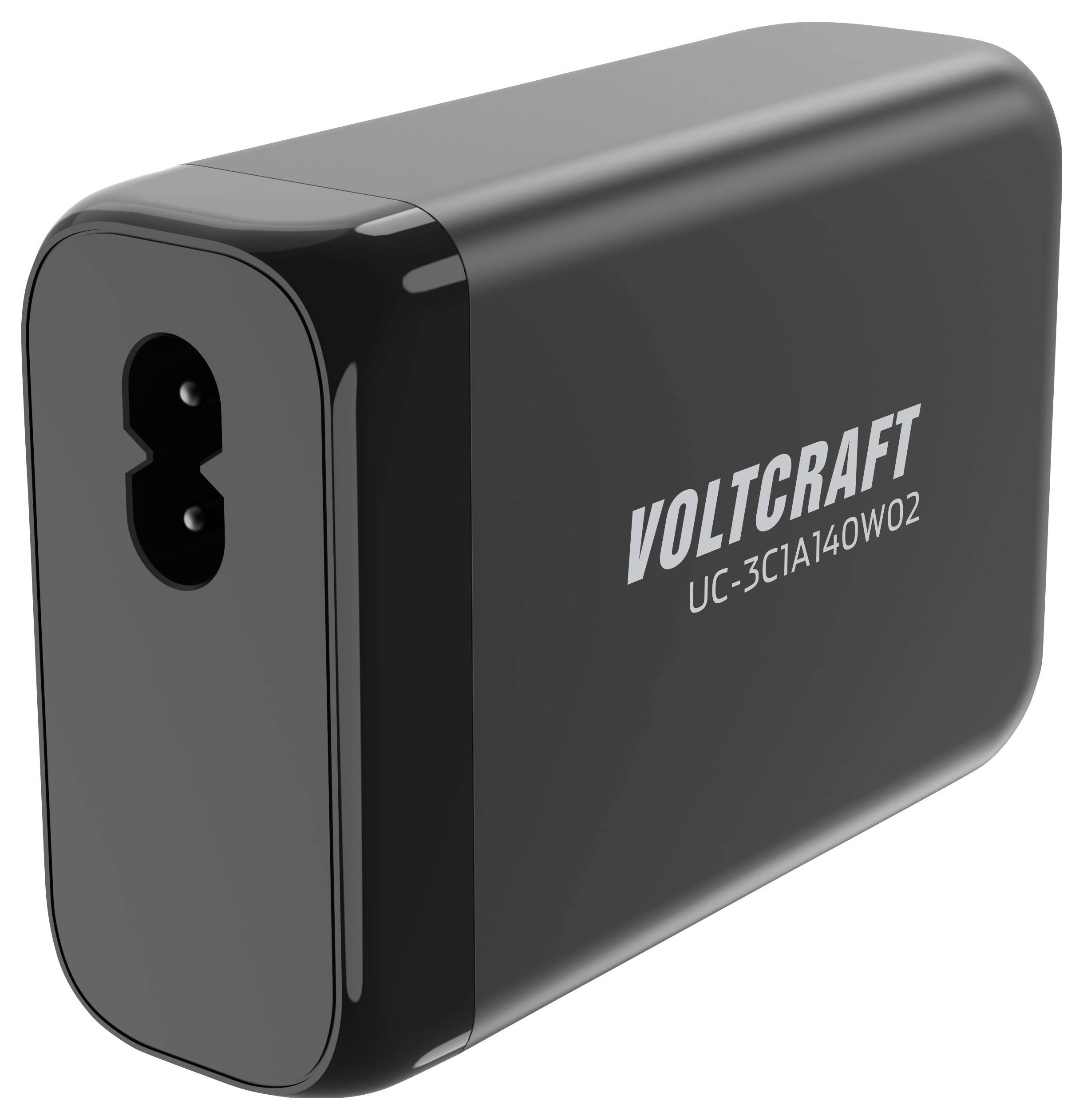 Kompaktní černá nabíječka s nápisem 'VOLTCRAFT UC-3C1A140W02', jsou viditelné dva síťové vstupy.