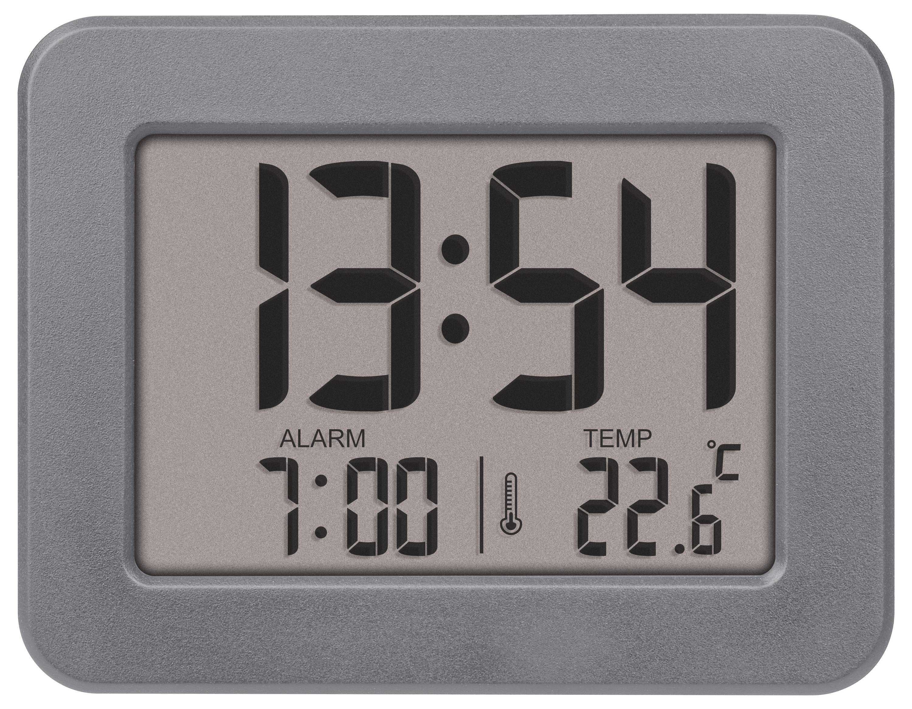 Digitální hodiny ukazují 13:54. Budík je nastaven na 7:00. Teplota činí 22,6 stupňů Celsia.