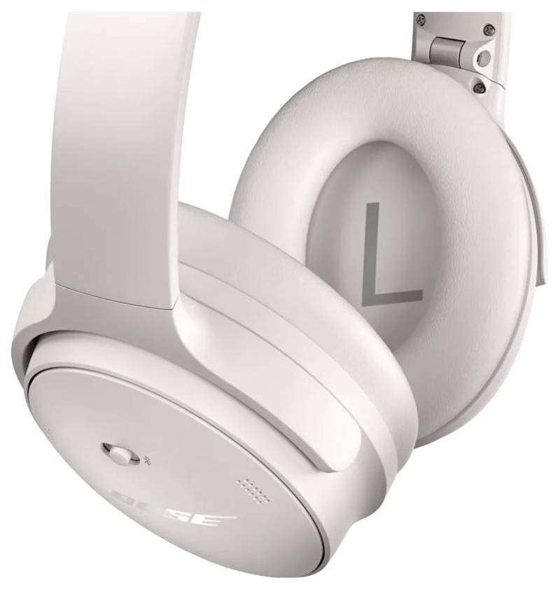 Bílá sluchátka s měkkými náušníky, označená písmem 'L' pro levé ucho, vykazují elegantní, moderní design.