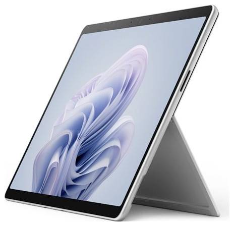 Tablet s elegantním, abstraktním vzorem na obrazovce stojí na stojanu.