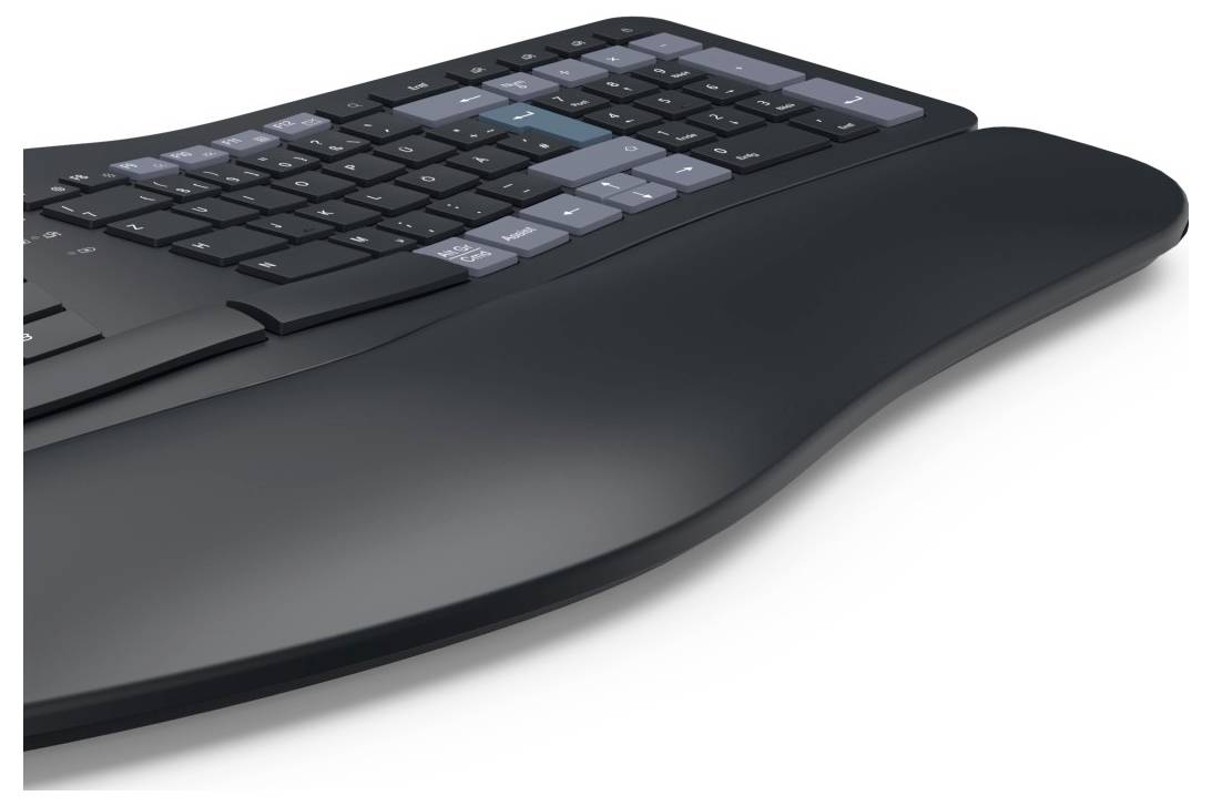 Ergonomická klávesnice s opěrkou zápěstí, navržená pro pohodlné psaní. Má zaoblené, rozdělené klávesy.
