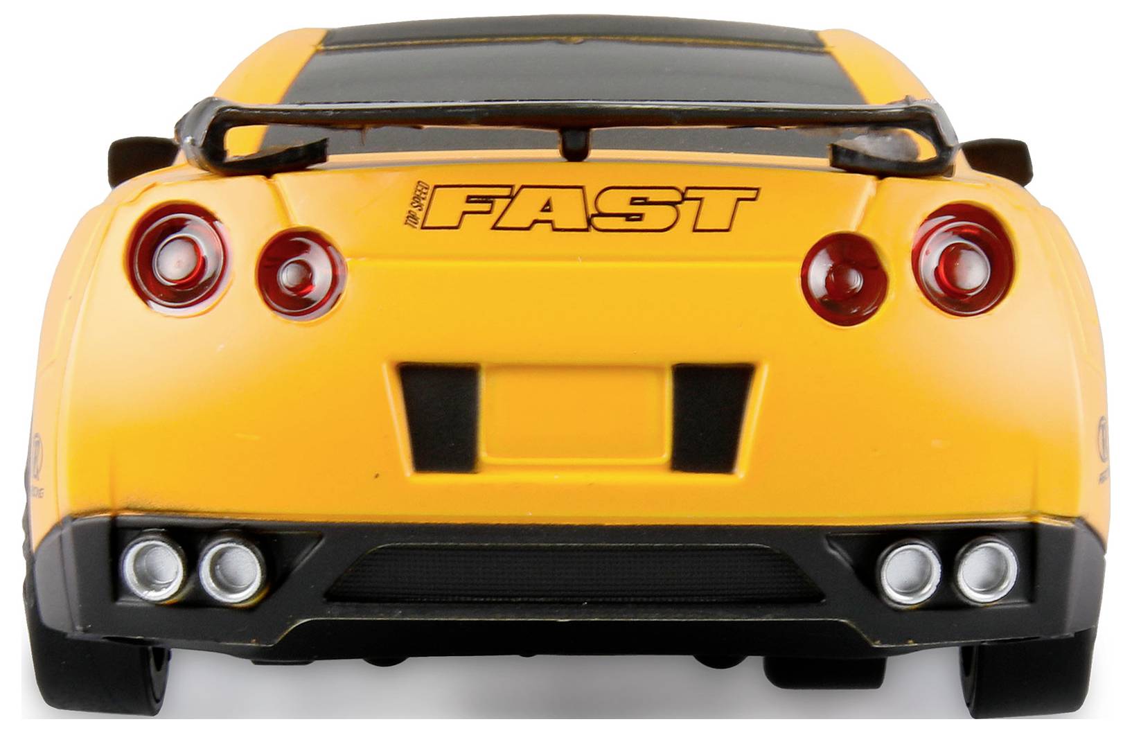Žluté sportovní auto zezadu, na zádi je napsáno 'FAST'.