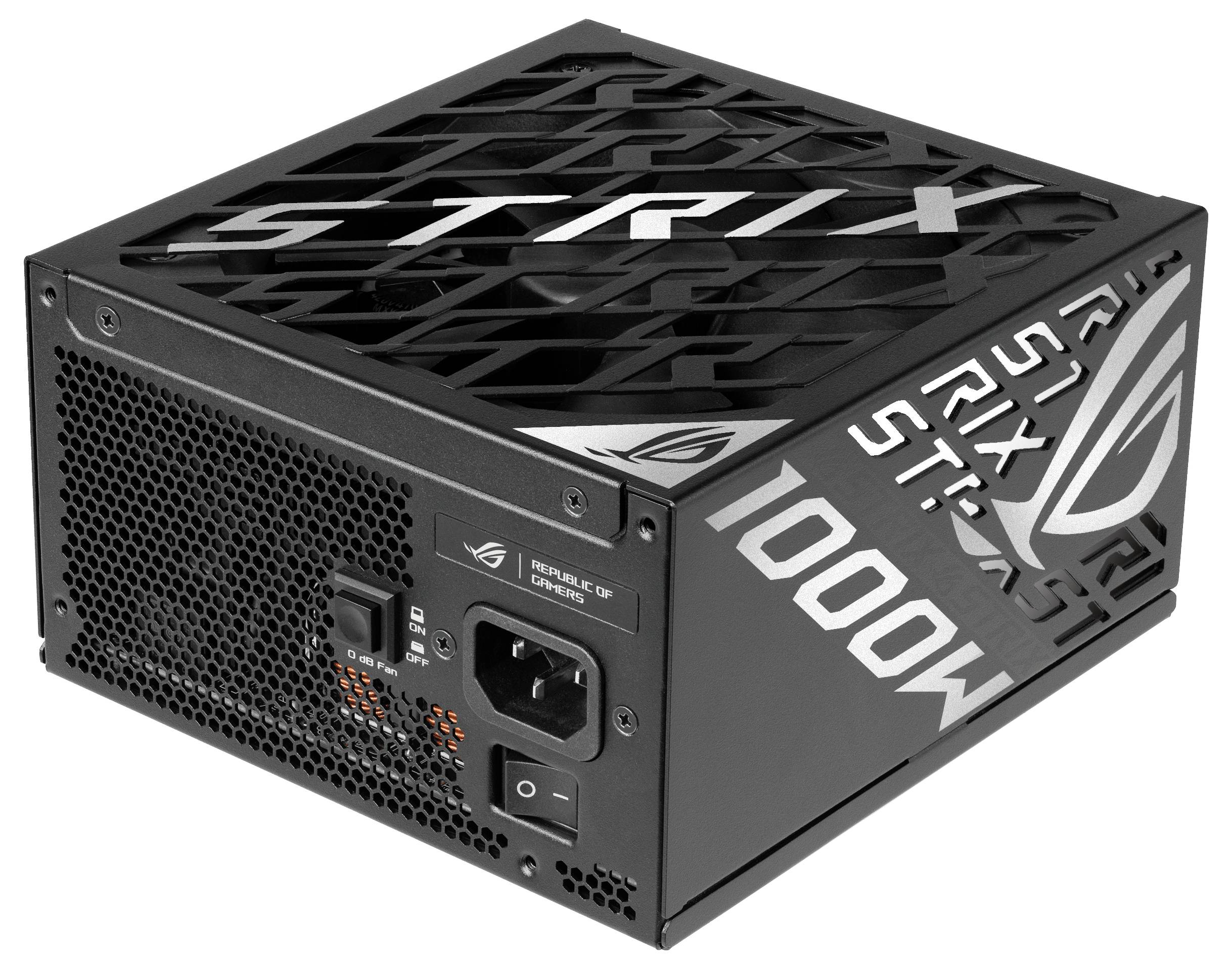 Černý počítačový zdroj s nápisem 'STRIX 1000W', větrací mřížkou nahoře a konektory na straně.