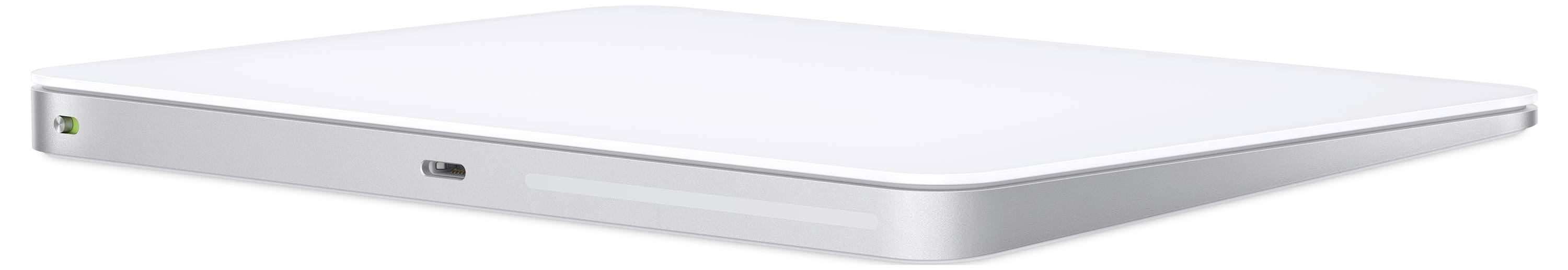 Plochý, obdélníkový, stříbrný externí disk s oblými rohy a USB připojením, umístěný na bílém povrchu.