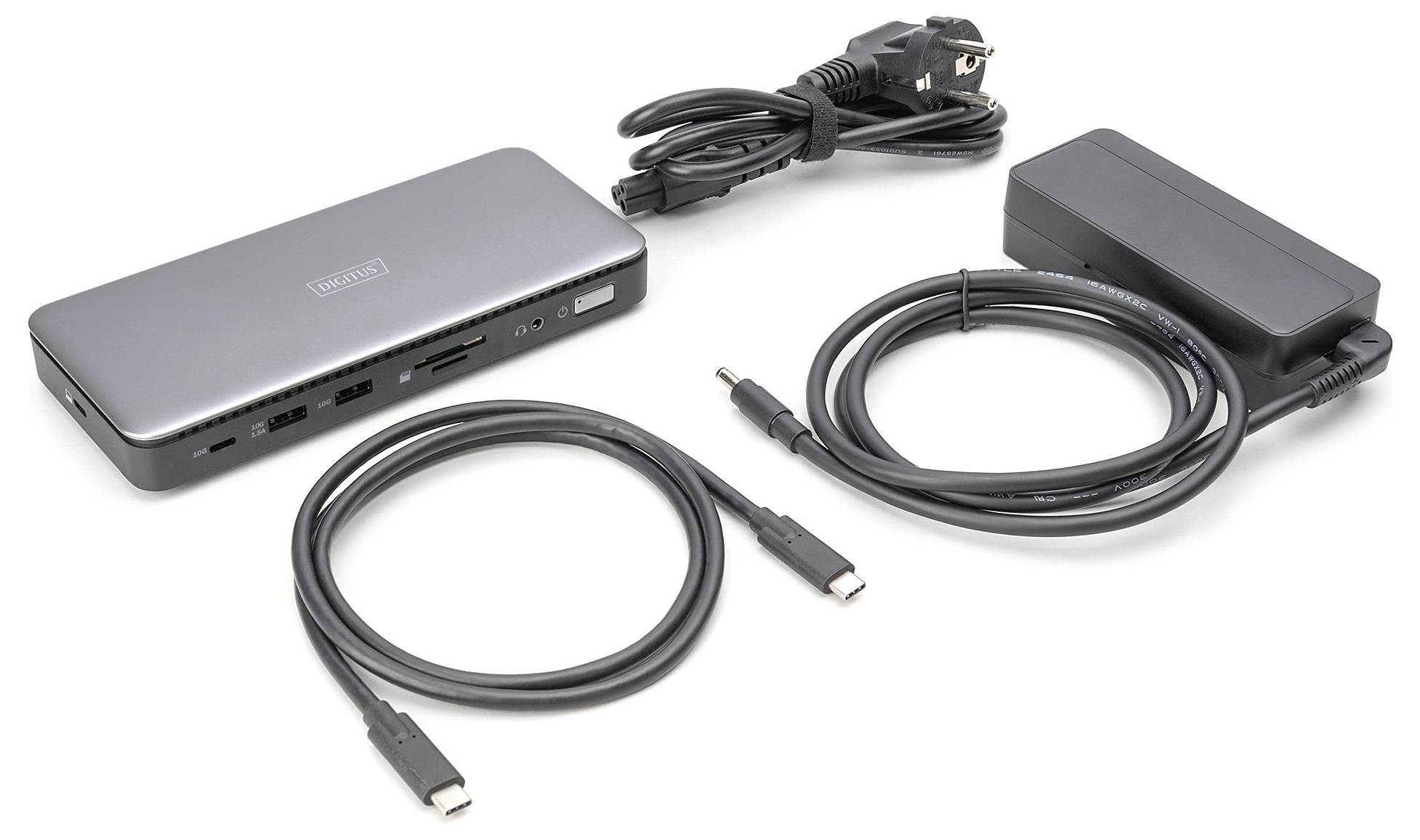 Dokovací stanice se síťovým adaptérem a kabely. Obsahuje několik USB, HDMI a display portů pro rozšíření připojení zařízení.