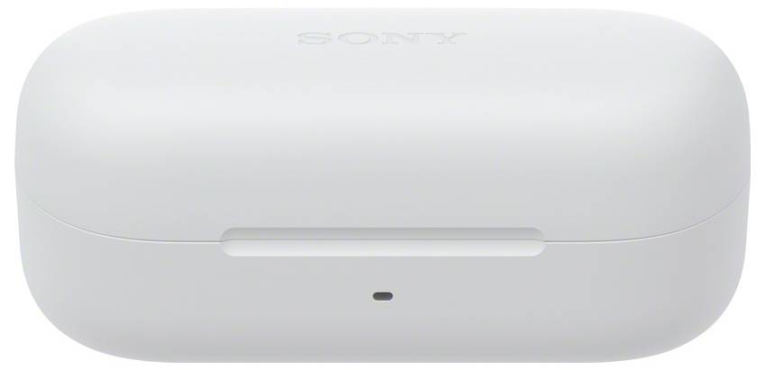 Bílý nabíjecí obal se logem Sony pro bezdrátová sluchátka, uzavřený, s indikátorem nabíjení na přední straně.