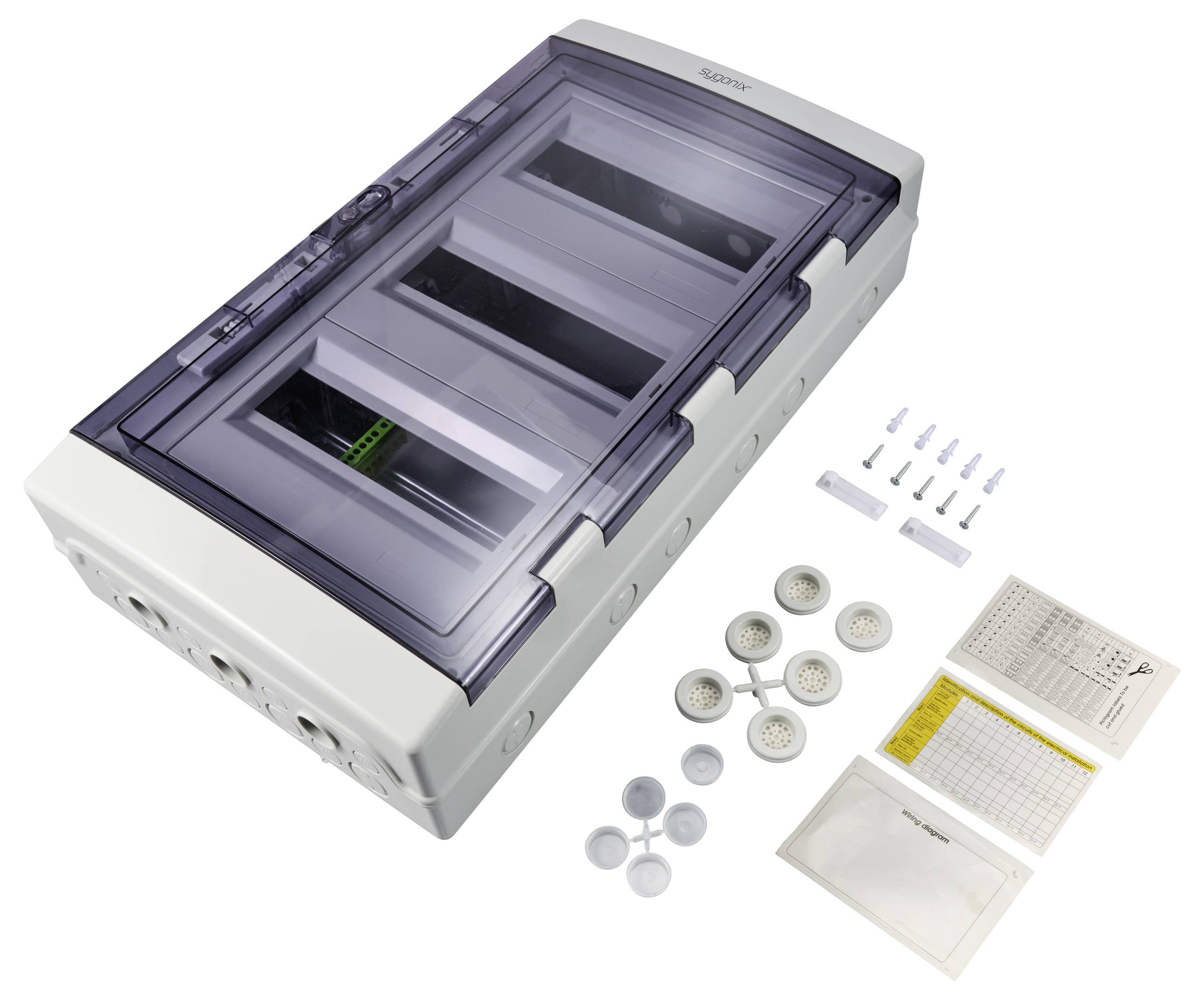 Rozvodná skříň s průhledným víkem, několika otvory a příslušenstvím, jako jsou šrouby a kryty, vedle ní.