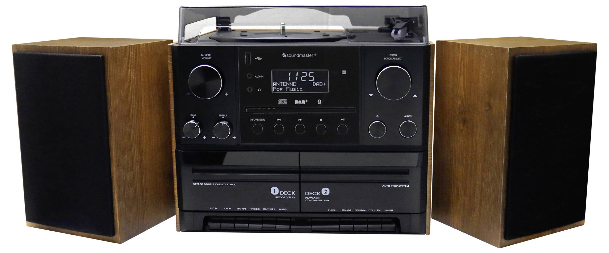 Stereoinstalace se dřevěnou skříní, sestávající ze dvou reproduktorů a centrální konzole s indikátorem rádiových stanic a kazetovým magnetofonem.