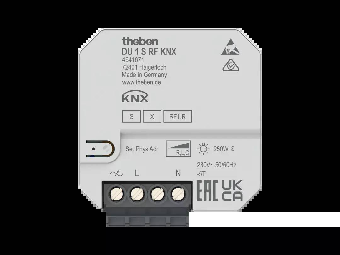 KNX spínací aktor s anténou a přípojkami. Označený: 'DU 1 S RF KNX', 250V/230V AC, 50/60 Hz. Výrobce: Theben.