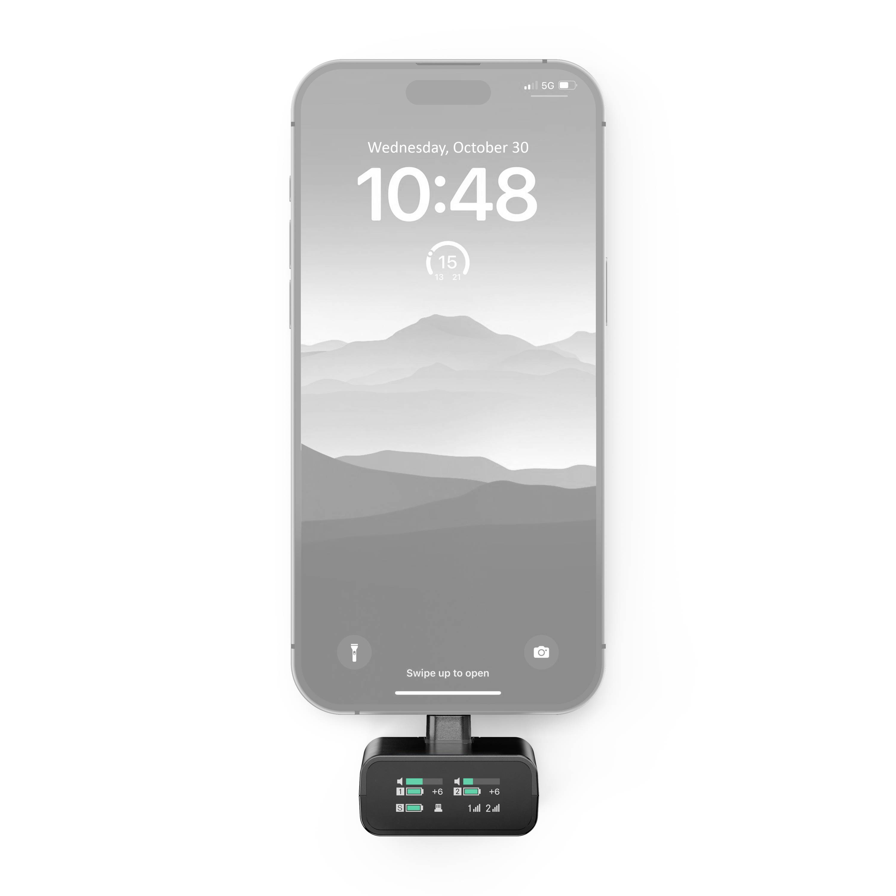 Chytrý telefon zobrazuje snímek uzamčené obrazovky s časem 10:48 a datem 30. října. Je připojen k malému obdélníkovému zařízení.