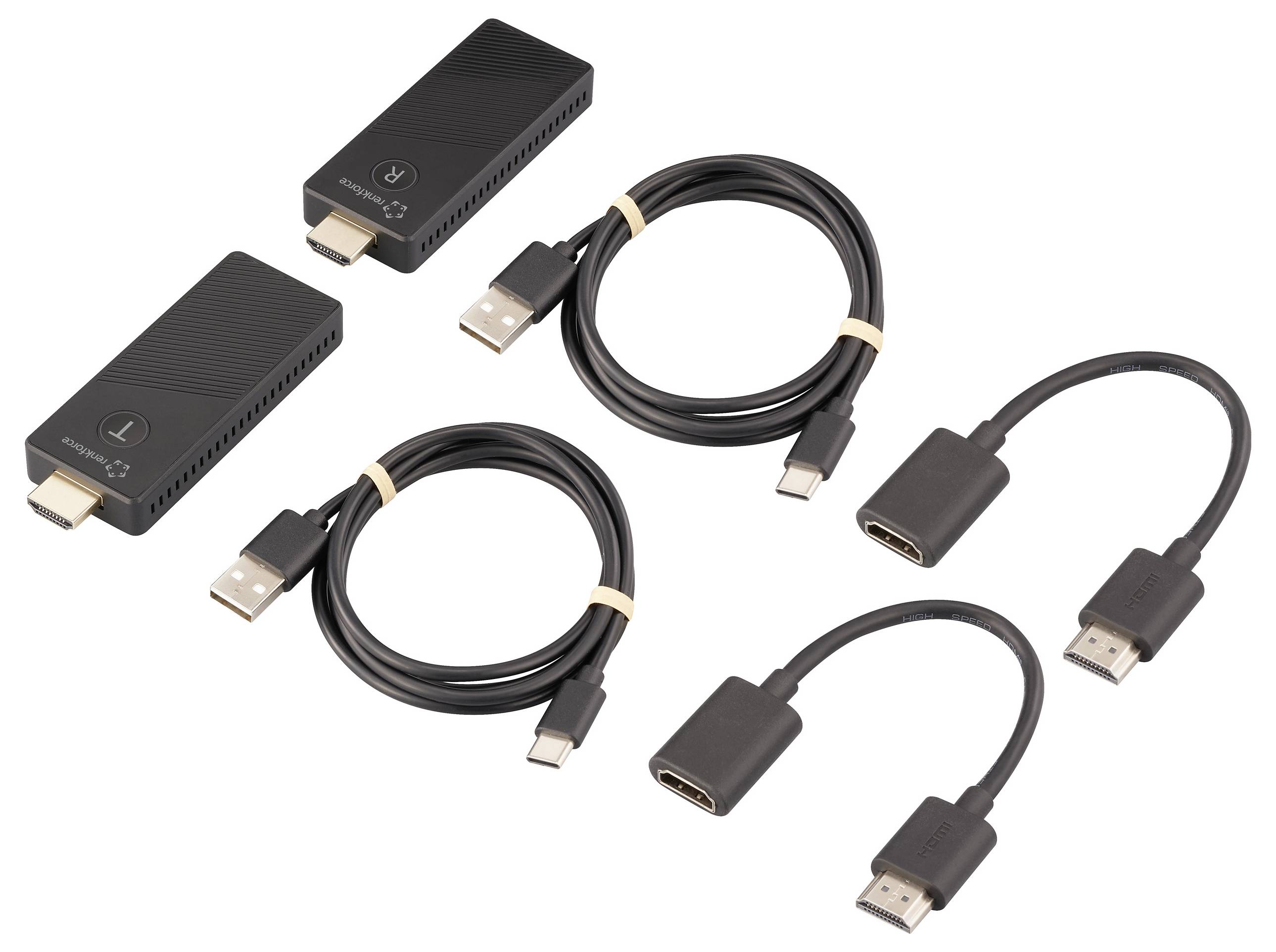 Dva bezdrátové HDMI přenosové sety s vysílači, přijímači a propojovacími kabely, vhodné pro přenos videa a audia.