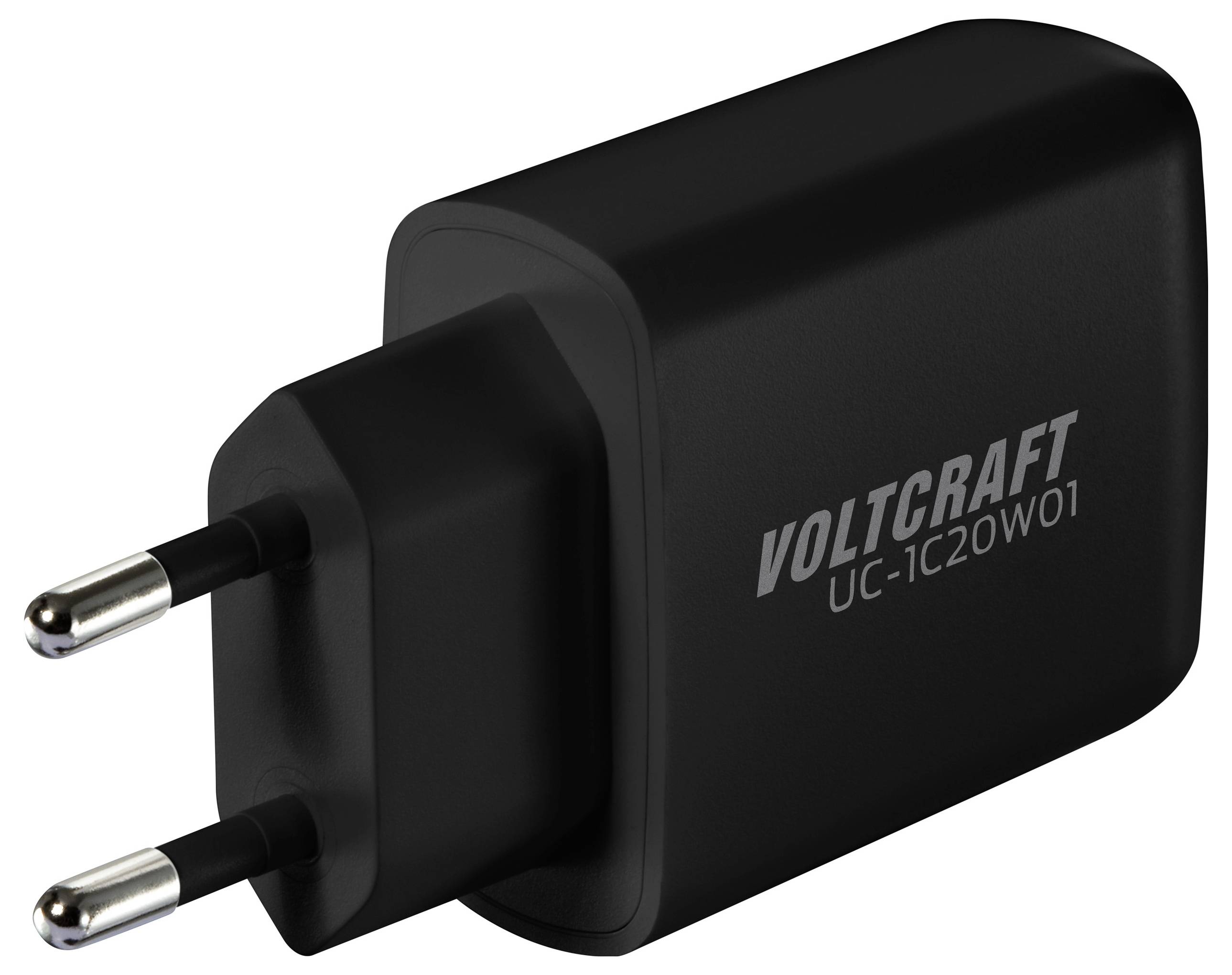 Černá USB nabíječka s eurokonektorem, označená štítkem 'Voltcraft UC-1C20W01', vhodná pro nabíjení elektronických zařízení.