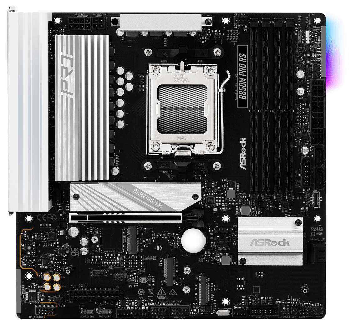 Základní deska počítače od ASRock, model B650M Pro RS. Béžové kovové chladicí prvky a černý obvod, viditelné četné sloty a konektory.
