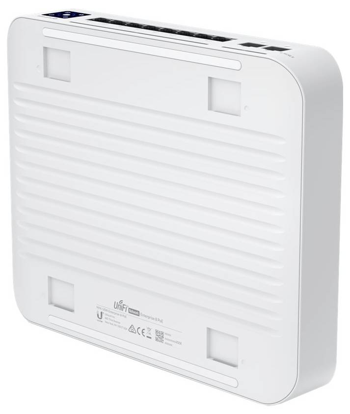 Bílý síťový switch obdélníkového tvaru s několika ethernetovými porty a logy na spodní straně.