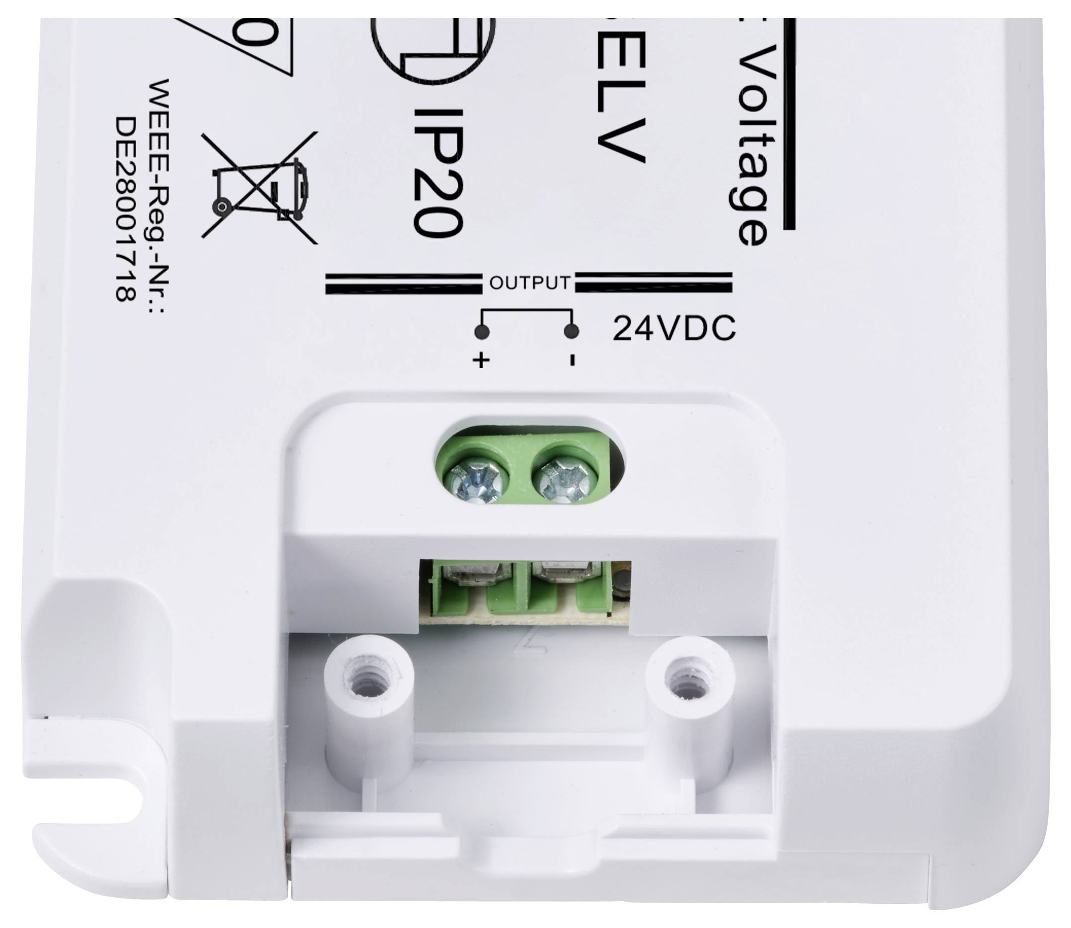 Elektronické zařízení s nápisem '24VDC OUTPUT'. Má přípojky a různé technické specifikace na svém povrchu.