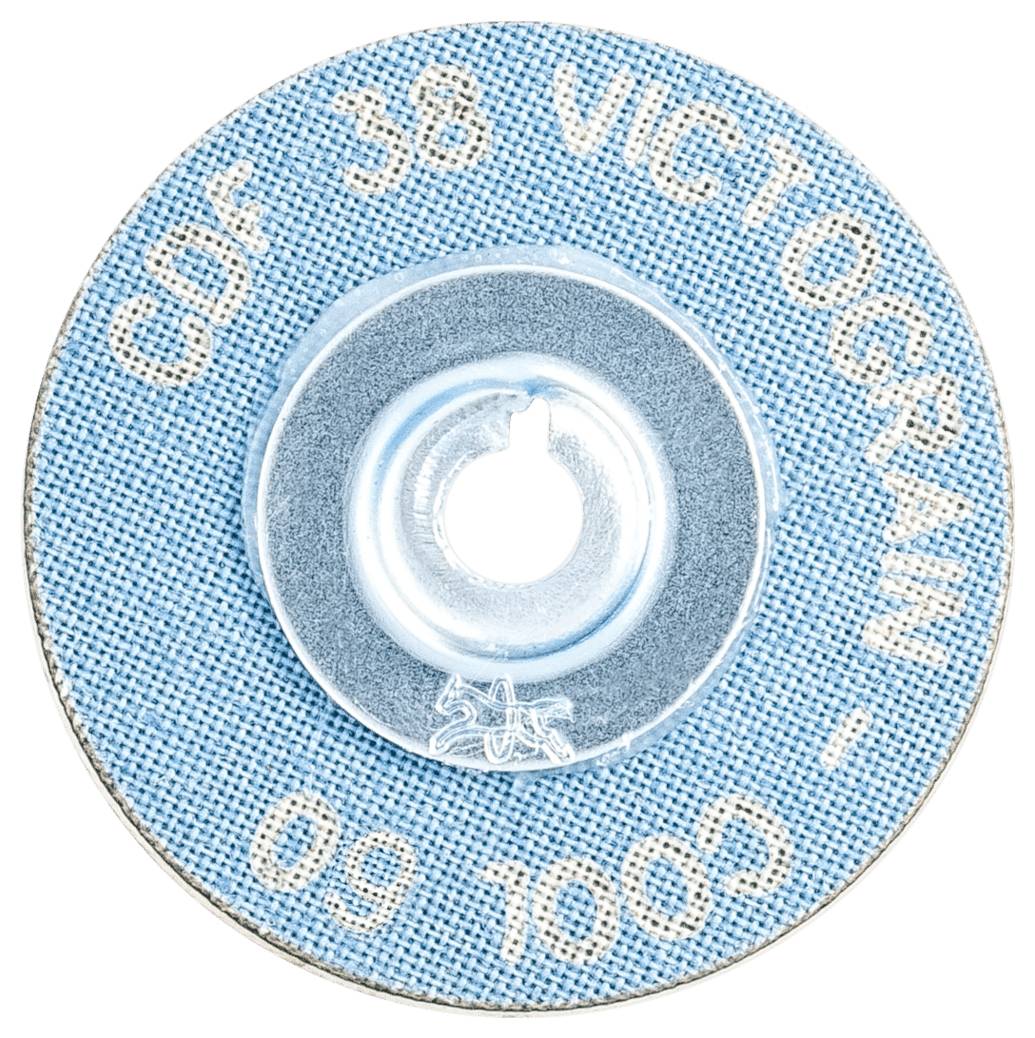 Kulatý, modrý brusný kotouč s nápisem 'CDF 38 Victogram - Cool 60'. Centrální kovový nástavec pro upevnění.
