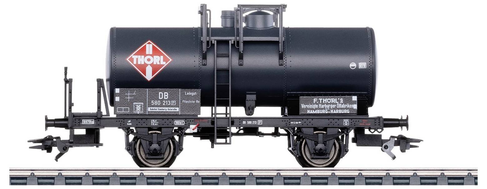 Model nákladního vagónu na kolejích, lakovaný černou barvou s logem 'THORL', s detailním označením pro realistický vzhled.