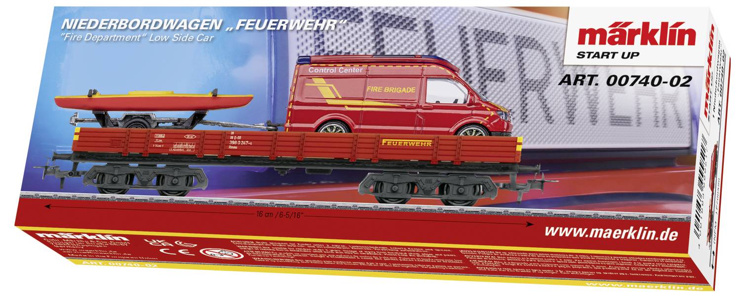 Obal ukazuje model hasičského auta Märklin na nízkém nákladním voze s lodí. Text obsahuje slovo 'Hasiči'.